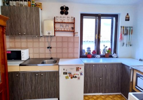 Venkovský rodinný dům 4+1 s vedlejšími stavbami a zahradou s pozemkem 1 598 m² v obci Olešná