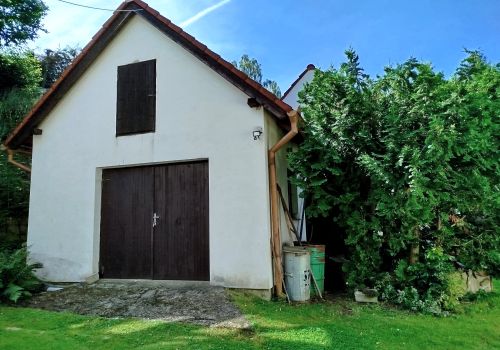 Venkovský rodinný dům 4+1 s vedlejšími stavbami a zahradou s pozemkem 1 598 m² v obci Olešná