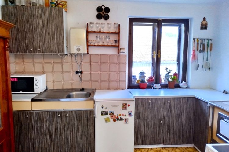 Venkovský rodinný dům 4+1 s vedlejšími stavbami a zahradou s pozemkem 1 598 m² v obci Olešná